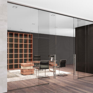 Parete divisoria in vetro trasparente GlassMood Parete divisoria in vetro trasparente con ante fisse e scorrevoli: soluzione versatile per abitazioni e uffici.
