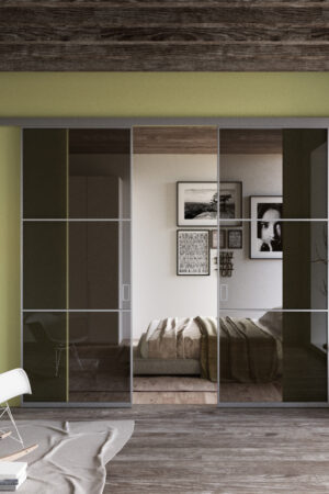 Porta scorrevole esterno parete doppia anta industrial 2 Porta scorrevole esterno muro doppia anta contrapposta modello Industrial. Vetro bronzo trasparente alluminio argento. Perfetta per arredare con stile.