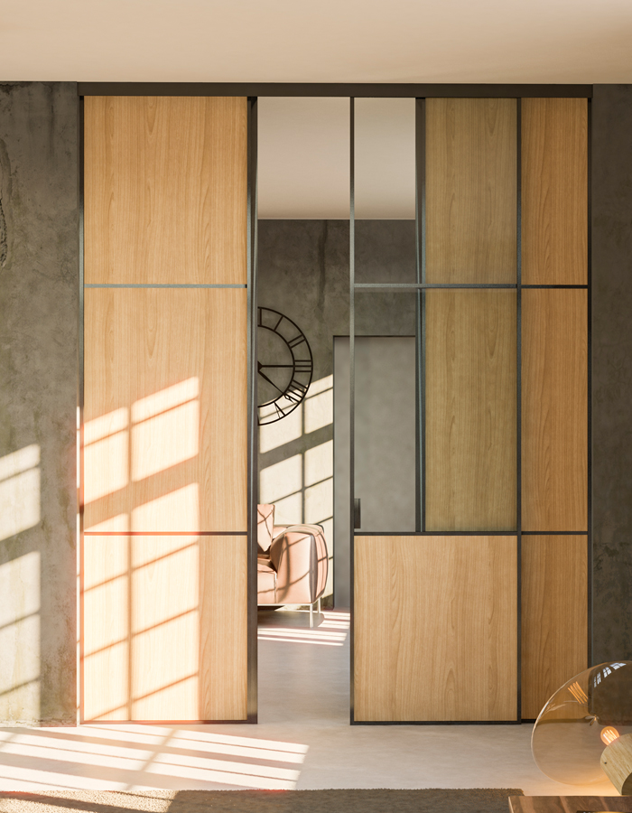 Sistema scorrevole in luce 2 ante fisse 1 mobile industrial wood Porta scorrevole a 2 ante fisse e 1 anta mobile centrale, con bordo alluminio testa di moro e pannello in legno ,vetro trasparente per l'anta mobile.Design industrial