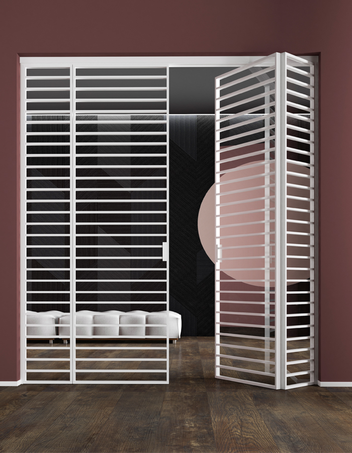 porta pieghevole a libro vetro alluminio industrial maxi Porta pieghevole 4 ante Industrial Maxi caratterizzate da profili orizzontali complanari al bordo dell’anta bianco e vetro trasparente