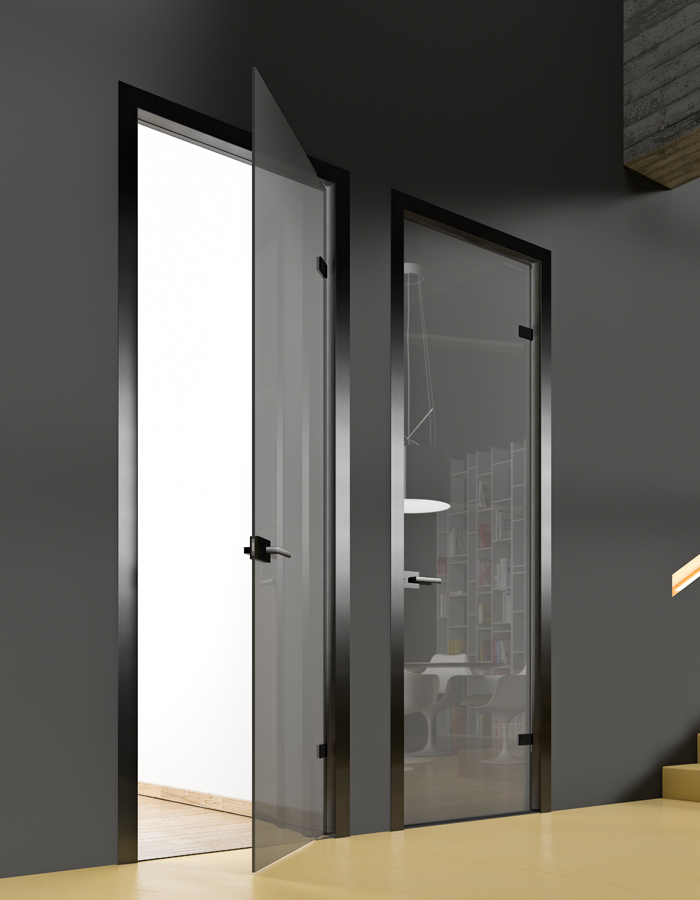 Porte battenti con telaio in alluminio Modular e ante in vetro Glassmode Porte battenti con telaio in alluminio Modular e ante Glassmode in vetro grigio trasparente,alluminio nero. Design moderno ed elegante
